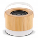 Enceinte sans fil en bambou avec base et anse blanche pour transport couleur bois